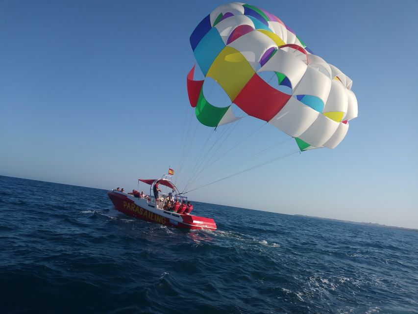 Alicante: Boat Trip and Parasailing Experience with Drink - Sharing the parasail with four companions