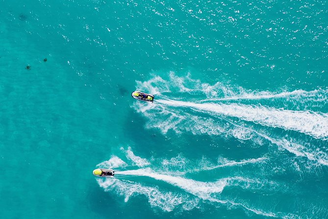 Bahamas Watersports Adventure: Parasail, Jet Ski, Banana Boat - Parasailing above Paradise Island