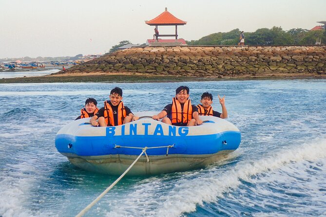Bali Watersport Package: Parasailing Adventure, Jet Ski, Banana and Donut Boat - Parasailing above Tanjung Benoa