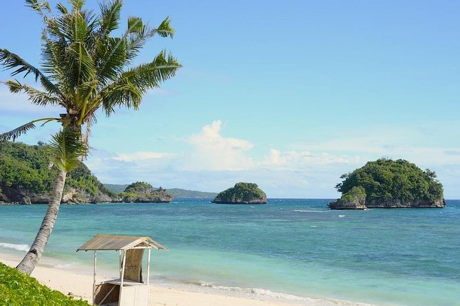 Boracay Island Hopping + Hot Kawa + Parasailing + Helmet Diving - A 20-minute helmet swim below White Beach