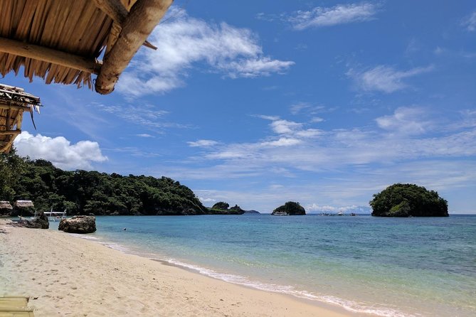 Boracay Island Hopping + Hot Kawa + Parasailing + Helmet Diving - Ilig Iligan Beach and the reef options