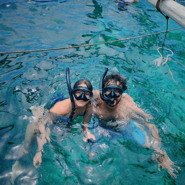 Boracay: Island Hopping with Lunch and Parasailing - Island hopping, swimming, and snorkeling
