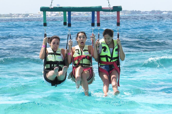 Cancun Combo Adventure: 4-Reef Stop Snorkeling and Parasail Ride - Weather, cancellations, and who should book