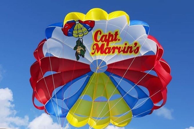Capt Marvin Watersports / Parasail - Private Tour - Taking off from Grace Bay in a private parasail boat