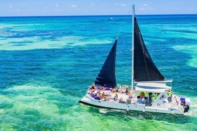 Catamaran Cruise with Snorkeling & Parasailing - Open bar, fruit, and the social mood