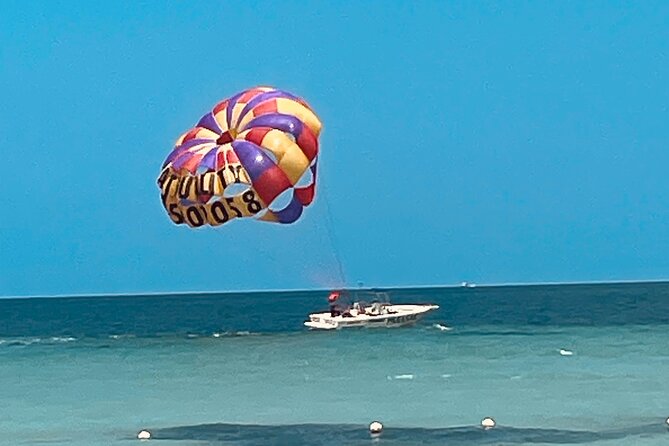 Customized Parasailing & JET-SKI - Taking the small boat to the parasailing vessel