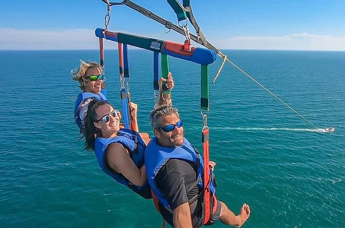 Jetski and Parasailing w/ Entry & Private Transportation - A local guide can make the transfer feel less wasted