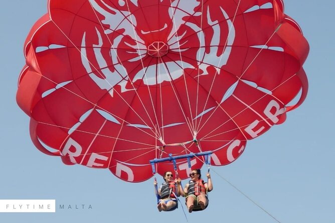 MALTA - Go & Fun Parasailing Free Photos & Videos - Safety briefing, harness, and boat launch