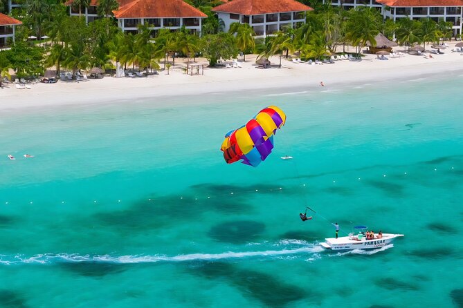 Negrils Seven Miles Beach, Rick's cafe and Parasailing Tour. - Key points at a glance