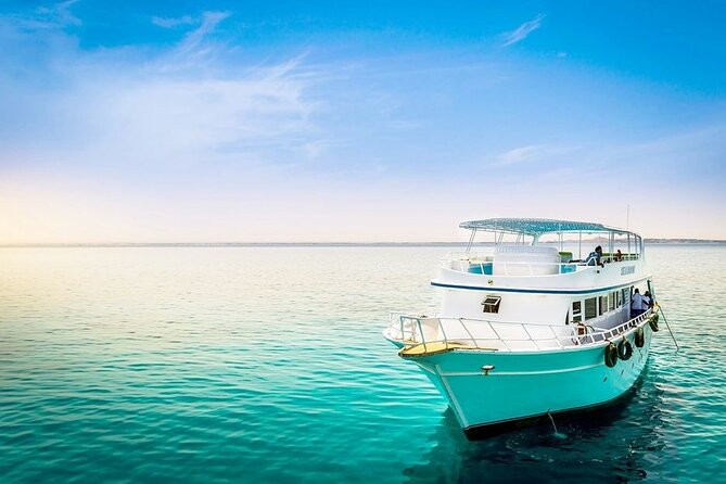 Orange Bay Island Boat Trip and Parasailing with Lunch - Hurghada - Banana and Quadra rides add a quick burst of action