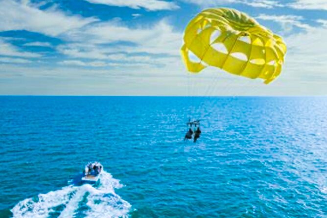 Parasailing above Turquoise Ocean Waters in Montego Bay - What to pack for the wind and water
