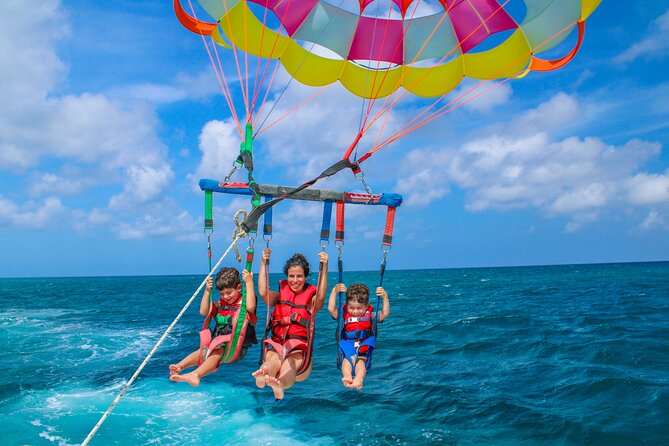Parasailing Adventure Aruba - Getting fitted for a single, tandem, or triple flight