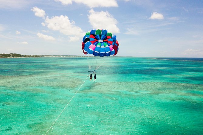 Parasailing Adventure from Providenciales in Turks and Caicos - Flying over Grace Bay for a wider view