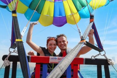 Parasailing in Dubai with Palm Jumeirah and JBR Beach views