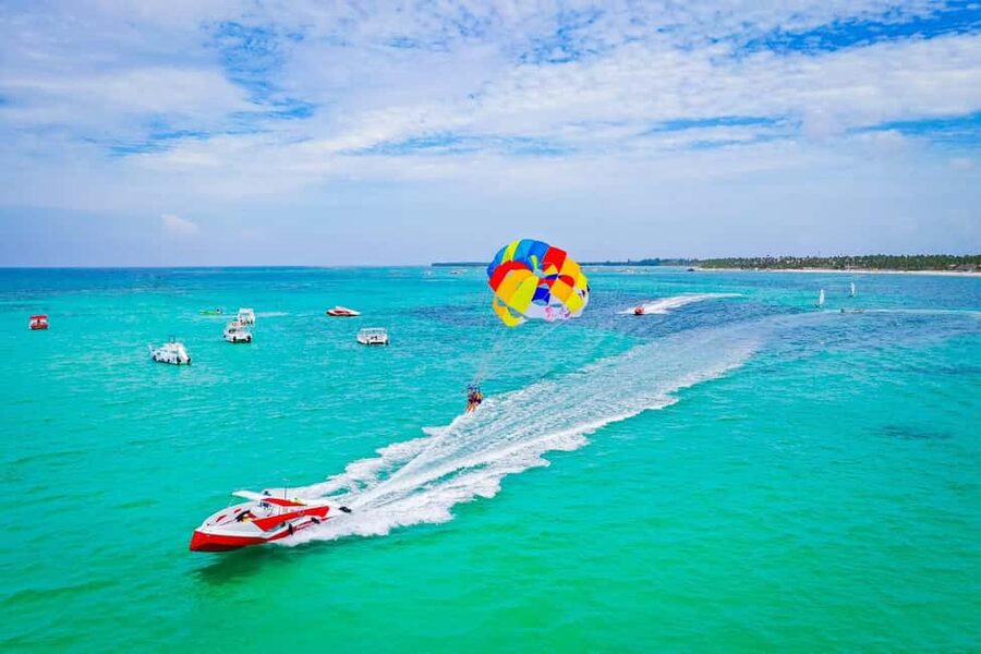 Punta Cana Area: Party Cruise with Parasailing and Open Bar - Parasailing above Punta Cana’s water