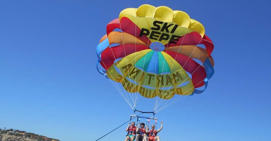 Santa Eulària des Riu: Parasailing Boat Cruise with Drinks - Flying above Ibiza’s northern coves
