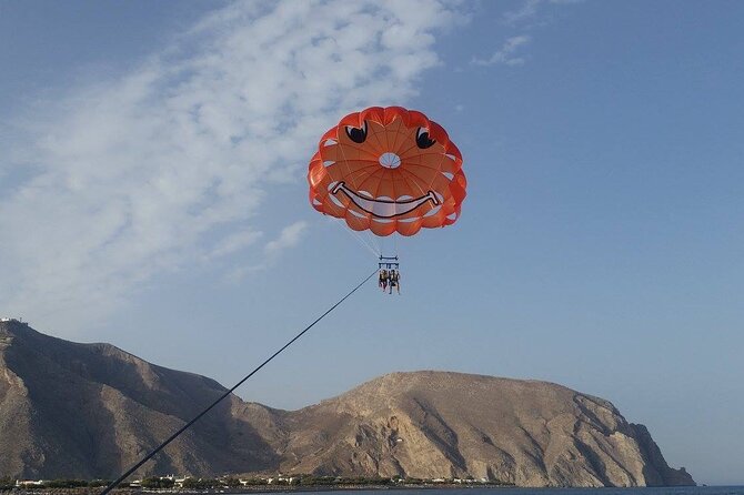 Santorini: Parasailing Flight Experience at Black Beach - Rising to 300 feet above the water