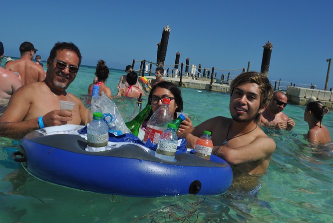 Snorkeling Catamaran Tour & Parasailing - Fruit, drinks, music, and the natural pool