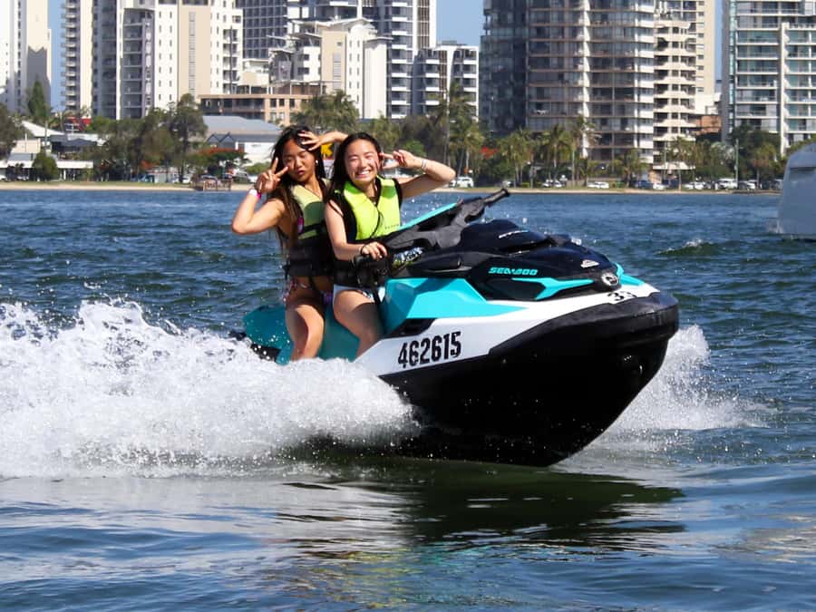 Surfers Paradise: Parasailing and Jet Ski Tour Package - Parasailing above the Gold Coast